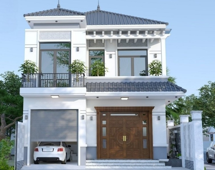 Nhà mái Nhật 2 tầng có gara tận dụng không gian, tối ưu công năng và đảm bảo tính thẩm mỹ. Ảnh: Xaydungnhauytin
