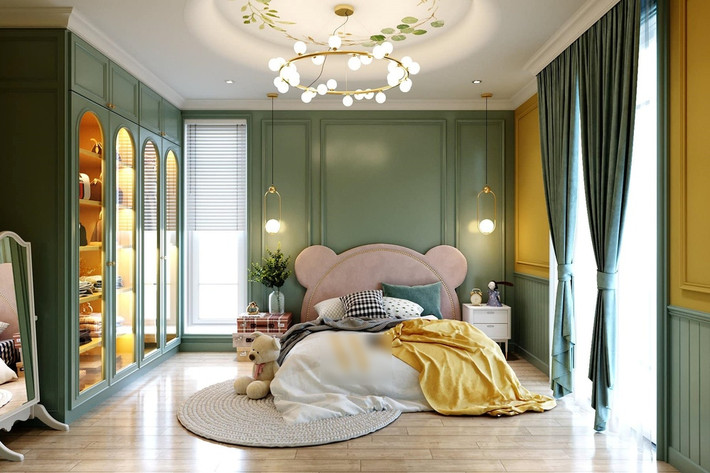 Phòng riêng của em út Bing Bing không hề kém cạnh khi được thiết kế vô cùng dễ thương, lấy hai tông màu xanh - vàng làm chủ đạo.