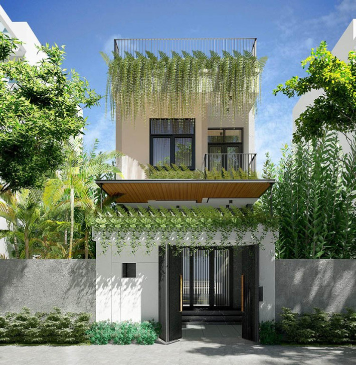 Do mặt tiền 4m khá hạn chế, căn nhà được thiết kế tối giản chỉ có những khối hình vuông vắn. Dù vậy, công trình vẫn gây chú ý bởi diện mạo trông vô cùng tươi xanh và mát mẻ. Ảnh: Wedo