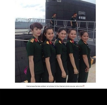 Trang Guangming sử dụng những hình ảnh về các nữ quân nhân trên các trang web của Việt Nam và tổng hợp trên các trang mạng nổi tiếng trong nước như Sohu, Baidu... và mô tả "Vẻ đẹp nữ quân nhân Việt Nam gây sốt mạng Internet".