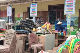 Ổn định cuộc sống cho người dân sau mưa lũ, đảm bảo học sinh đến trường