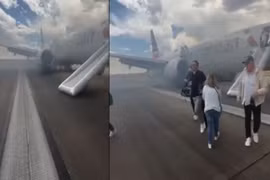 Máy bay chở 173 người bốc cháy khi cất cánh, hành khách tháo chạy