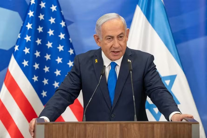 Trong bài phát biểu sau đó, Thủ tướng Israel Benjamin Netanyahu tuyên bố nước này sẽ tiếp tục các cuộc tấn công nhằm vào Iran trong nhiều ngày cho tới khi "mối đe dọa này được loại bỏ". Ảnh: Pool.
