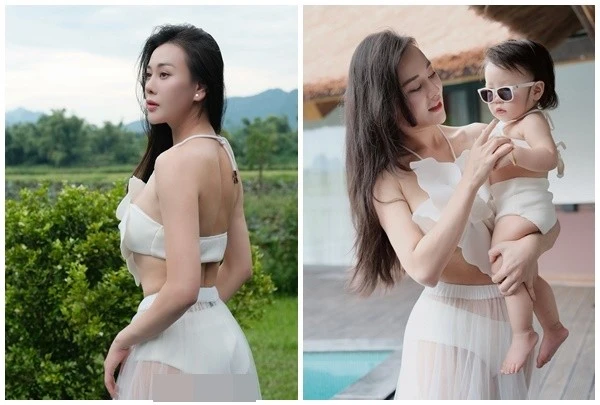Phương Oanh khoe vòng ba quyến rũ bên bể bơi