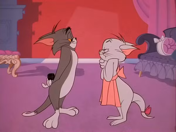 4. Tán tỉnh. Chú mèo thân yêu chỉ ra cho chúng ta cách làm thế nào để gây ấn tượng với một người phụ nữ ngay trong lần đầu gặp mặt.