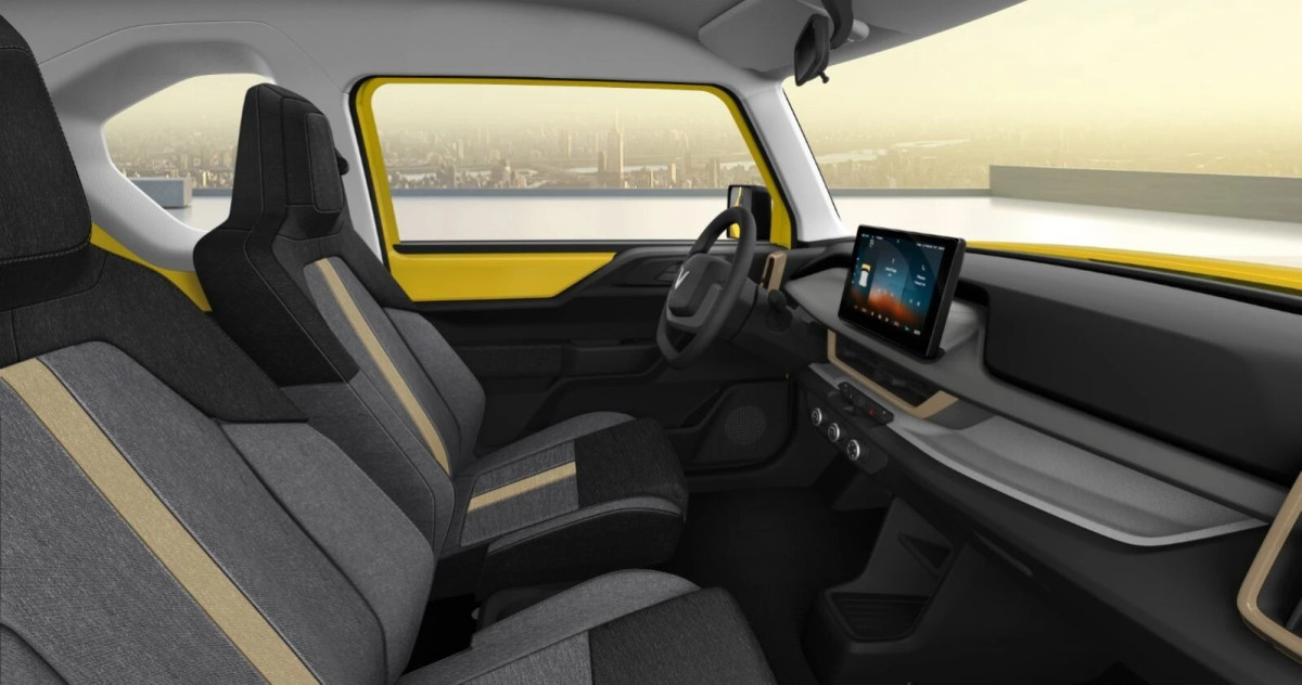 VinFast cũng vừa tung ra những hình ảnh về nội thất chiếc VF 3. Ghế ngồi sử dụng chất liệu nỉ, phần tựa đầu liền khối cho cả hai ghế trước và hàng ghế sau. Màn hình giải trí 10 inch được đặt ở trung tâm, bên dưới là các nút bấm vật lý điều khiển.