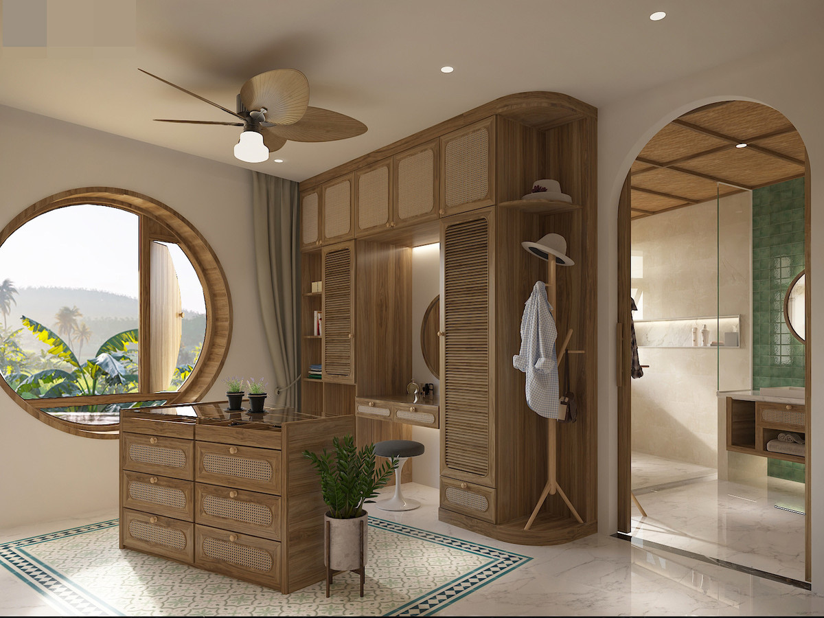 Phòng thay đồ, trang điểm ở phòng ngủ master. Khung cửa tròn tạo sự mềm mại và cổ điển cho công trình.