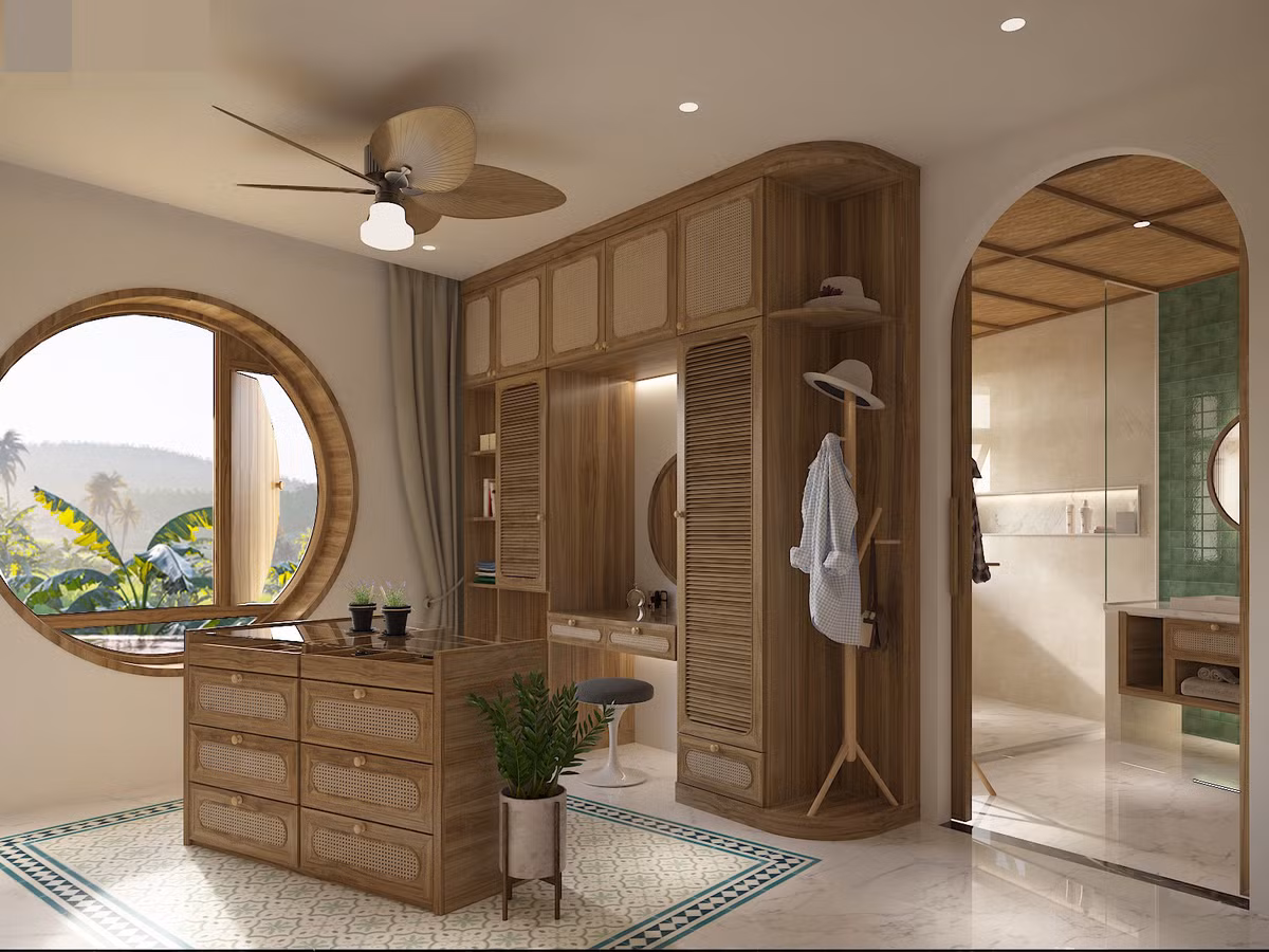 Phòng thay đồ, trang điểm ở phòng ngủ master. Khung cửa tròn tạo sự mềm mại và cổ điển cho công trình.