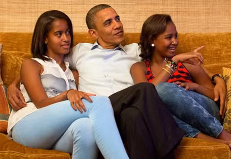 Tổng thống Obama và hai cô con gái.