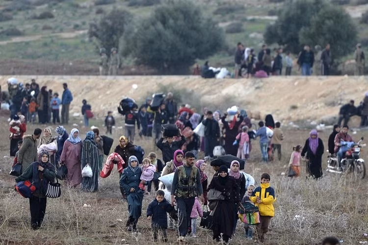 Những người tị nạn Syria chạy sang Thổ Nhĩ Kỳ từ tỉnh Idlib của Syria.