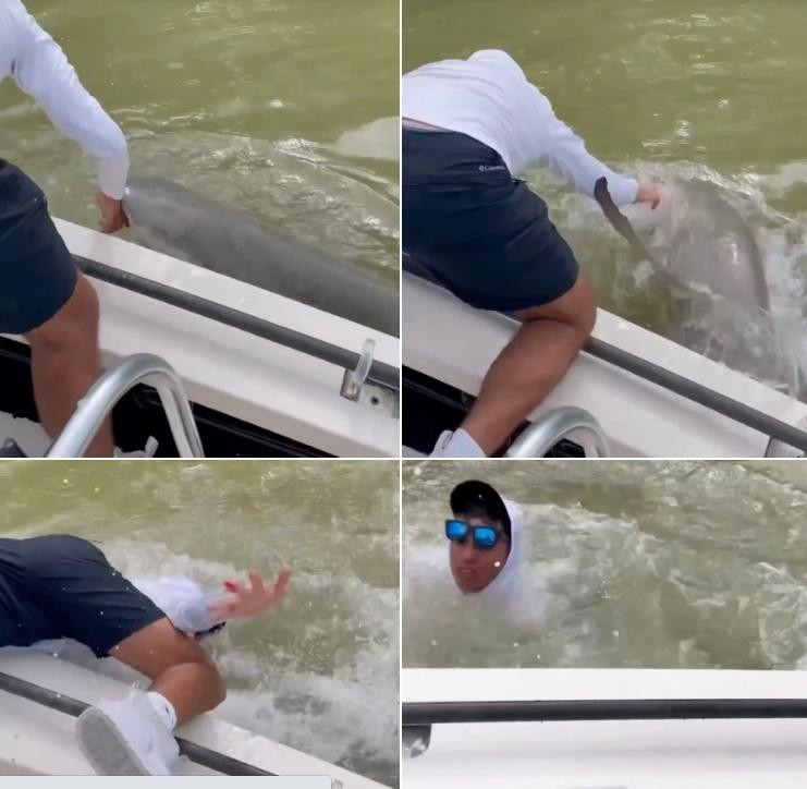 Du khach suyt mat mang khi bi ca map can tay, keo xuong nuoc