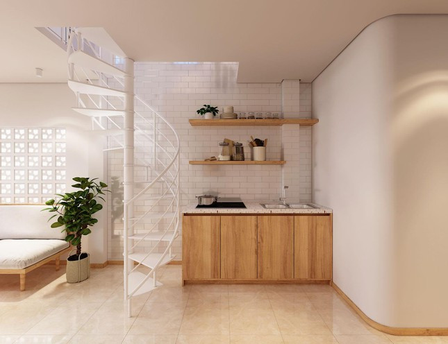 Sảnh cầu thang bố trí một chiếc ghế bench nhỏ, có thể ngồi thư giãn uống trà, đi ra không gian phía trước, nơi này được tạo ra với mục đích chính là khu làm việc, đọc sách hoặc cũng có thể là để ngủ, với phương châm linh động và đơn giản nhất.