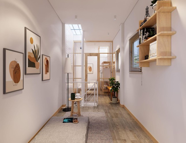 Ở sân sau vì ngôi nhà chật hẹp nên ánh sáng rất ít, do đó KTS đề xuất làm thông tầng và lấy ánh sáng từ mái xuống để cho sân sau và khu giặt đồ được đủ sáng.