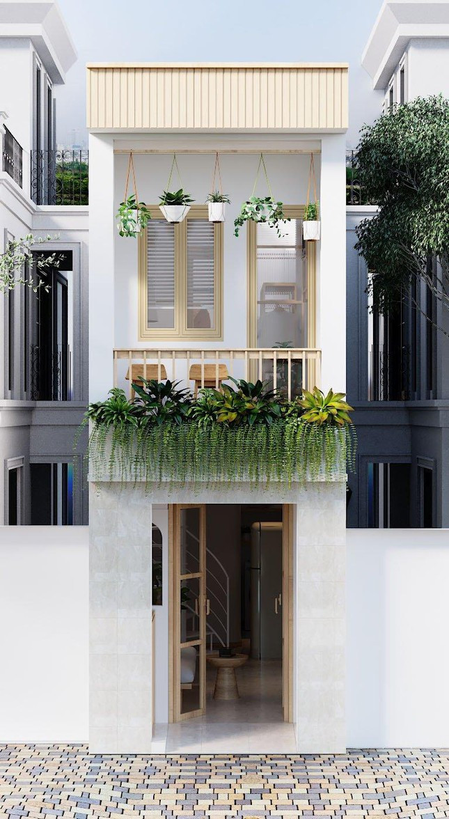 Căn nhà còn có khu ban công, diện tích tương đối nhỏ, nhưng vẫn đủ cho 1 chiếc ghế nhỏ cùng với đó là 1 dãy hoa treo tạo cảm giác chill sâu lắng, giúp xua tan mệt mỏi sau 1 ngày làm việc áp lực.