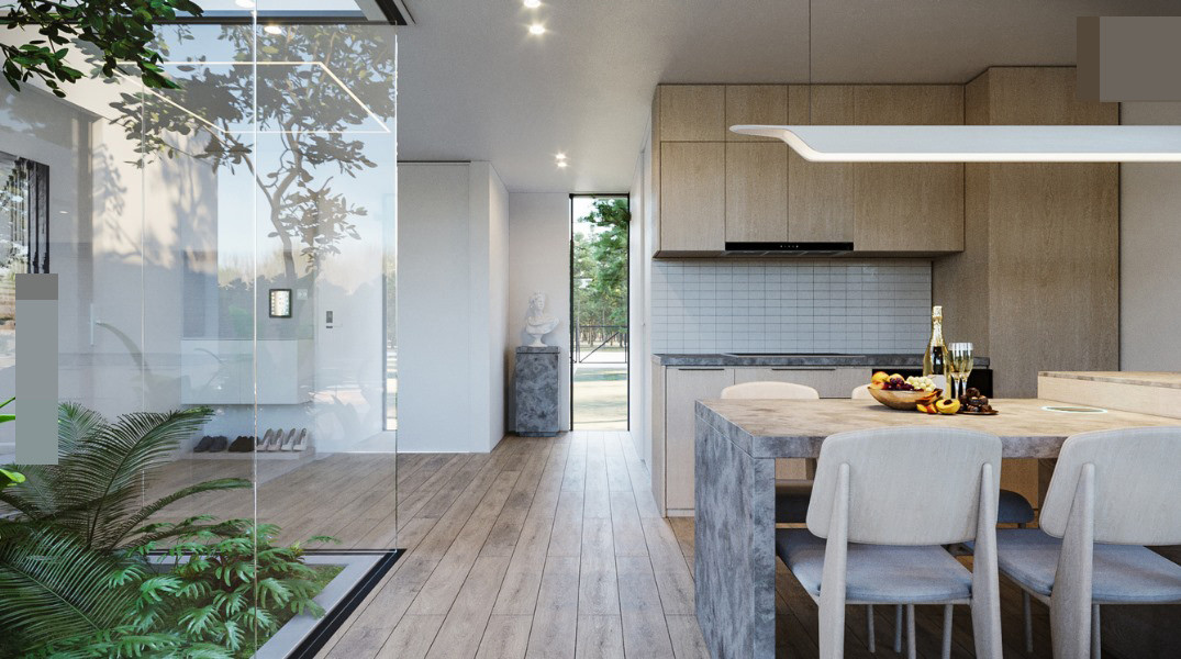 Phòng bếp dùng màu trang nhã, mang hơi hướng phong cách bắc Âu. Bàn ăn bằng tấm đá mài nhám, liên kết với bàn đảo.