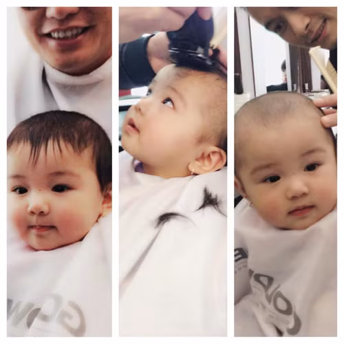 Chàng doanh nhân đưa con gái đi cắt tóc.