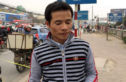 Nga - người điều khiển xe máy.