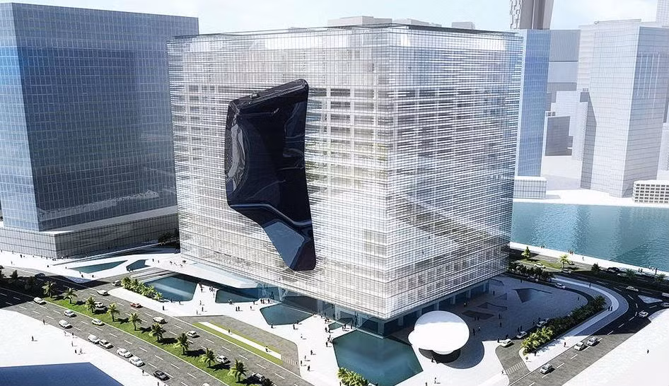 Cao ốc văn phòng Opus tại Abu Dhabi: Cao ốc được thiết kế như một khối hình lập phương độc lập, rất chắc chắn. Với nhiệt độ ở đây, bạn có thể nhầm tòa nhà như một khối băng có phần giữa đã tan chảy. Vào ban ngày, người ta không cảm nhận rõ lỗ thủng của tòa nhà, nhưng ban đêm, nhờ hệ thống đèn, khoảng trống rõ rệt hơn.