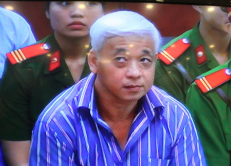 Trong vụ án này, bầu Kiên - nguyên Phó chủ tịch HĐQT, Phó chủ tịch Hội đồng sáng lập ngân hàng ACB - bị truy tố về 4 tội danh: kinh doanh trái phép, cố ý làm trái quy định của Nhà nước về quản lý kinh tế gây hậu quả nghiêm trọng, lừa đảo chiếm đoạt tài sản và trốn thuế.