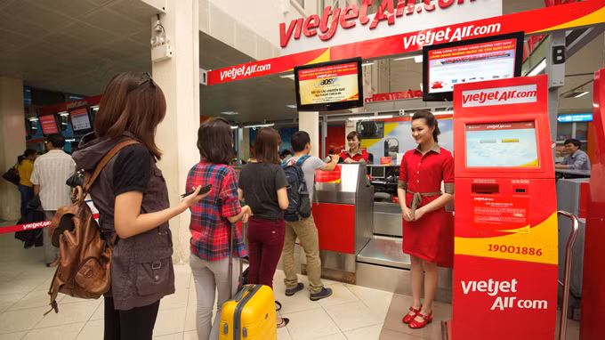 Hành khách VietJet Air làm thủ tục tại sân bay. Ảnh tư liệu.