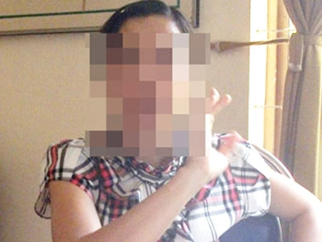 Vợ phó công an xã kể lại chuyện mình bị chồng đánh.