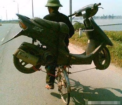 Xe thô sơ chở xe cơ giới.