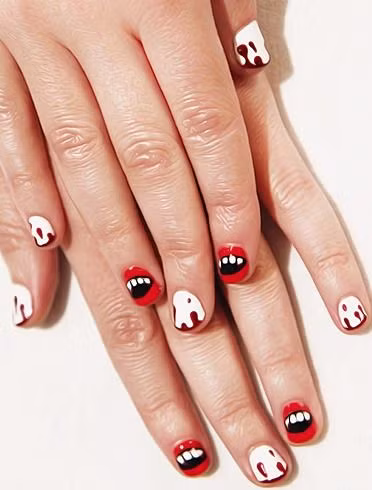 Ngón tay vấy máu với tông màu đen-đỏ-trắng cho bàn tay nổi bật đêm ma quỷ.