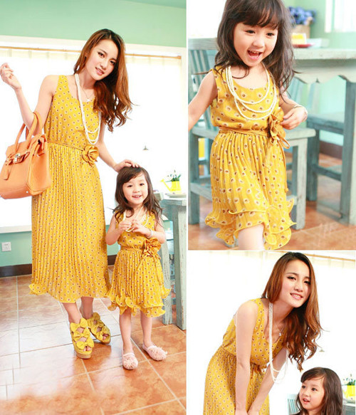 Nhấn nhá chút phong cách cổ điển với đầm liền thân dáng dài xếp nếp nữ tính.