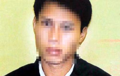 Lê Văn Huề tại cơ quan công an.