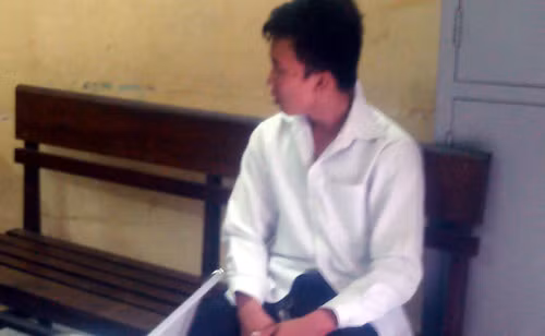 Lái xe taxi Lê Văn Duyệt tại cơ quan công an.