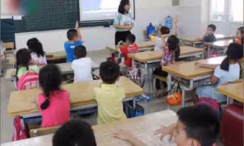 Giao vien muon nang luong phai nop tien “boi duong”