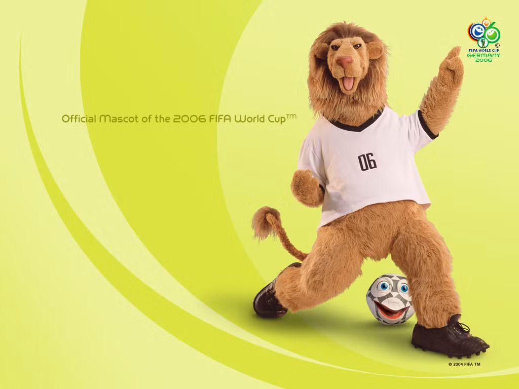 World Cup Đức 2006 là lần thứ hai sư tử trở thành linh vật. Lần này là Goleo VI, chú sư tử mặc chiếc áo thi đấu của Đội tuyển bóng đá quốc gia Đức với số áo 06. Đi cùng Goleo VI là một trái bóng biết nói. Ảnh: Pinterest.