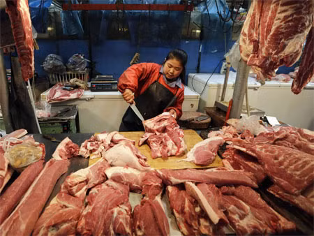 Năm 2012, Trung Quốc tiêu thụ 52 triệu tấn thịt lợn, nặng bằng 5.200 tháp Eiffel tại Pháp cộng lại.