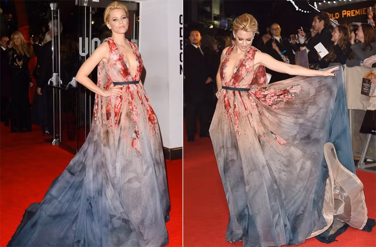 Elizabeth Banks thanh lịch trong chiếc váy màu xám pha đỏ của Elie Saab trên thảm đỏ buổi công chiếu "The Hunger Games: Mockingjay – Part 1".