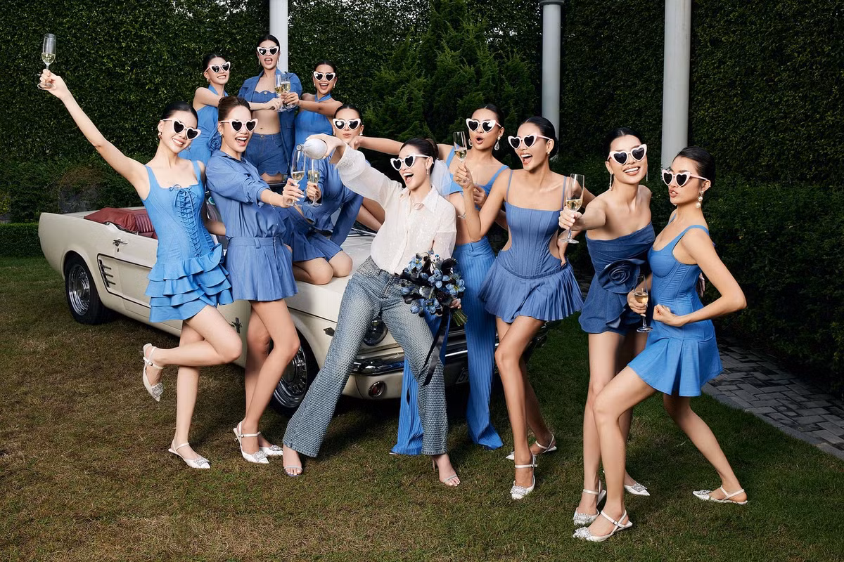 Trong bộ ảnh thứ hai, Khánh Vân mặc phong cách menswears, đầu đội mấn cô dâu. Các phù dâu diện trang phục khoe chân dài và eo thon cùng cách tạo dáng ấn tượng.