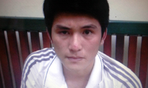 Tên cướp Long tại cơ quan công an.