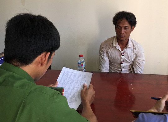 Phạm Văn Tuấn tại cơ quan công an. Ảnh: Công an cung cấp.