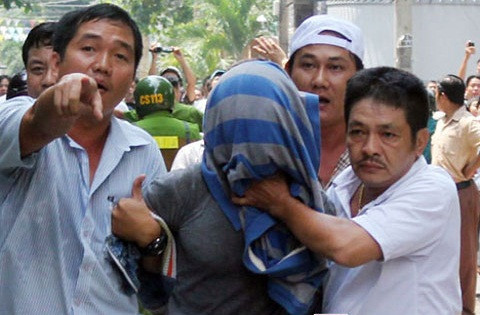 Đối tượng Cao Quốc Huy khi bị bắt.