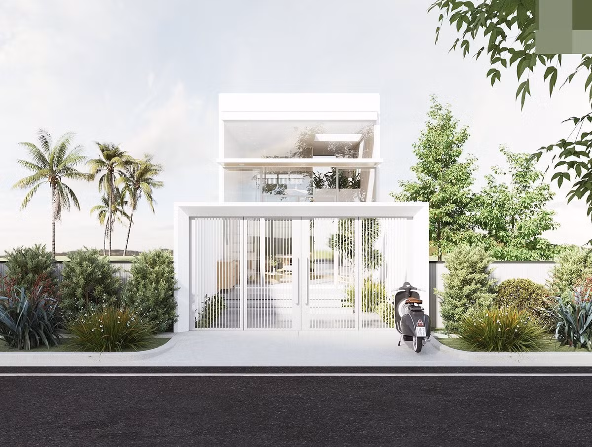 Ngôi nhà cấp 4 có gác lửng với mặt tiền đơn giản, sơn màu trắng. Cổng sắt 4 cánh rộng, lan sắt thông thoáng nhưng vẫn đảm bảo sự riêng tư cho không gian phía trong.