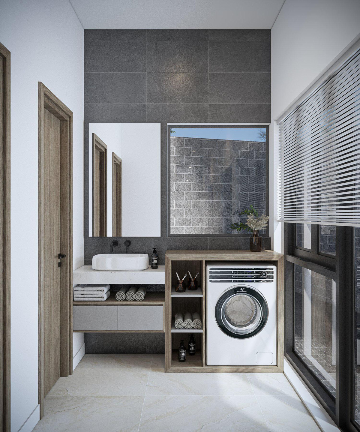 Phòng vệ sinh và khu giặt sấy tiện nghi. Gam màu xám, trắng giúp mở rộng diện tích và tăng tính thẩm mỹ cho không gian. Tủ âm tường sau bồn cầu là sự sáng tạo trong thiết kế, tận dụng góc chết thành nơi lưu trữ đồ hóa mỹ phẩm, giấy vệ sinh và đồ lặt vặt thật gọn gàng.