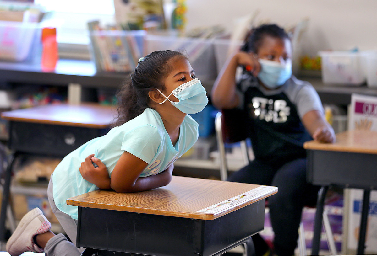 Tac dung phu tre co the gap phai khi tiem vaccine COVID-19