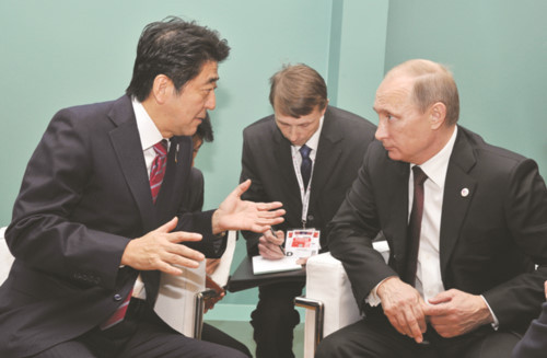 Thủ tướng Nhật Bản Shinzo Abe và Tổng thống Nga V.Putin trong một lần gặp gỡ