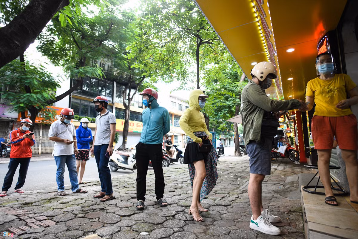 Anh tuan: Tiem dien thoai ban rau cu qua-Hinh-3