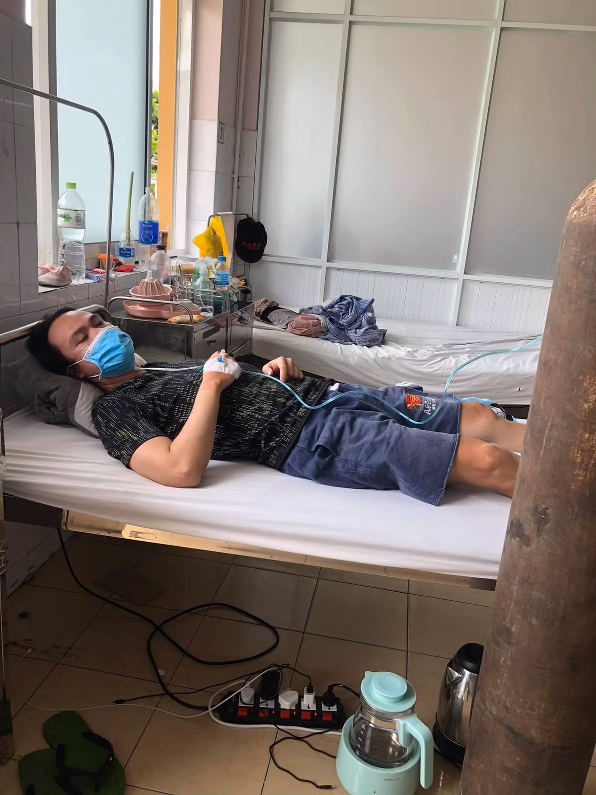 Nhac si Dao Trong Thinh nhiem COVID-19, phai tho may