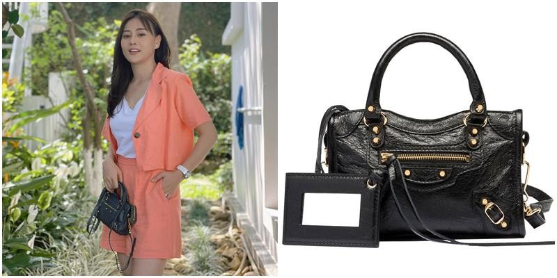 Diện bộ suit lửng màu cam đào trẻ trung, Nam mix cùng chiếc túi City Bag - item huyền thoại đến từ nhà mốt Balenciaga. Ở ngoài, chiếc túi gần 30 triệu đồng này từng được rất nhiều sao Vbiz trưng diện vì vẻ năng động mà thời thượng.