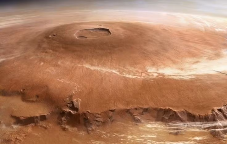  Hồ sơ tuổi đời: Các nhà khoa học ước tính Olympus Mons hình thành từ hàng trăm triệu đến vài tỷ năm trước, với các đợt phun trào có thể kéo dài đến thời kỳ địa chất gần đây. Ảnh: Pinterest.