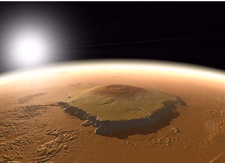  Cao nhất Hệ Mặt Trời: Olympus Mons cao khoảng 21.9 km so với bề mặt trung bình của sao Hỏa, gấp gần 2,5 lần đỉnh Everest của Trái Đất nếu tính từ mực nước biển. Ảnh: Pinterest.
