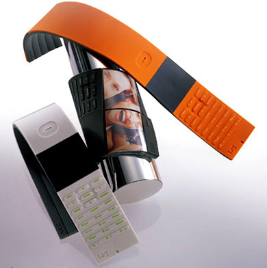 NEC Tag Phone là mẫu điện thoại mềm mại và linh hoạt, có thể quấn quanh cổ tay của người dùng. Mẫu điện thoại tương lai này có khả năng thay đổi hình dạng theo trạng thái, được thiết kế với cao su dẻo.