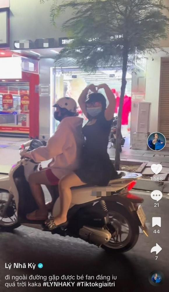 Ly Nha Ky phan ung bat ngo khi bi fan duoi theo chup anh