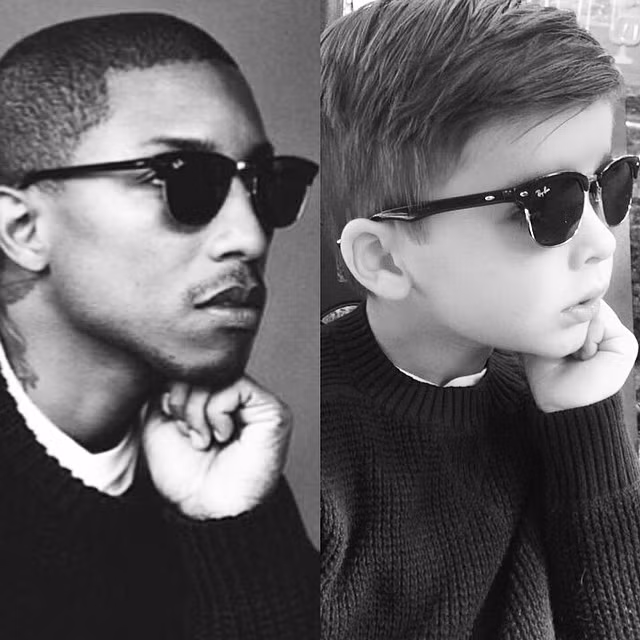 Pharrell William cũng là sao nam được cậu bé ưa thích và đạo lại phong cách với kính thời trang của hãng Ray-Ban và áo len của hãng GAP.